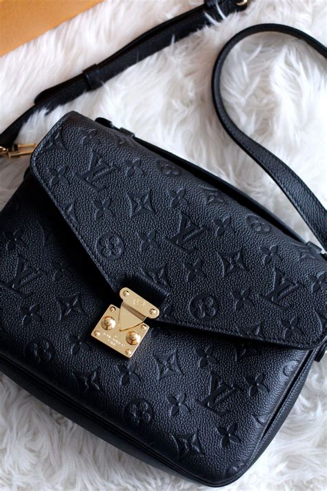 portamonete lv monogram black|LOUIS VUITTON Empreinte Pochette Metis Black .